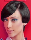 Neat short hairstyle with partly covered ears