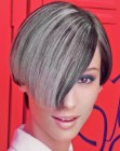 Sleek short hairstyle with a metallic silver hair color