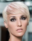 Elegant women's hairstyle with a short back and exposed ears