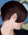 Short haircut with a graduated neck and curved bangs