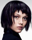 Chin length bob with rounded edges and jagged bangs