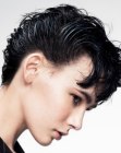 Female wet look hairstyle with combed back hair