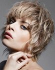 Carefree short hairstyle with a free spirited flair and wispy tips