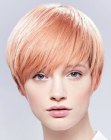 Short layered hairstyle with a combination of three hair colors