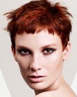 Short hairstyle with very short bangs and ruffled finger styling