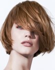 Chin length bob with movement and hair that curves in by itself