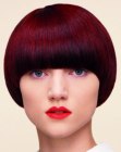 1960 inspired mushroom cut that resembles a helmet