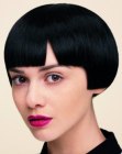 Sleek short hairstyle with a gap in the bangs