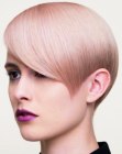 Short blonde hair with pink color accents