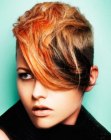 Short haircut with clipper cut sides for women