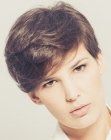 Easy to wear pixie cut with curved lines and bangs