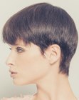 Flexible pixie cut with bangs and small sideburns