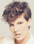 Pixie cut with sleek sides and a curly crown