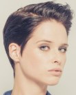 Sleek pixie cut with wet look styling