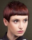 Sleek pixie haircut with very short bangs and exposed ears