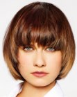 Contemporary short tapered haircut that frames the face