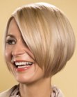 Smooth asymmetrical bob with a cutting line that follows the jaw