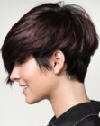 Comfortable and sporty pixie cut with longer top hair