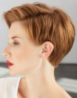 Pixie cut with clean lines and highlights