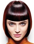 Chin length bob with blunt bangs for shiny brown hair