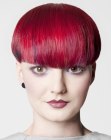 Very short bowl cut for bright red hair