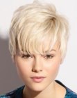 Pixie haircut with layers and long bangs