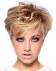 Blonde pixie cut with light long bangs