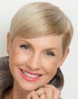 Pixie cut with smooth styling for older women