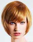 Just below the jaw bone bob for coppery blond hair