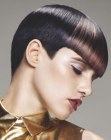 Pixie cut with clean lines and very short back and sides