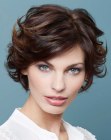 Short brown hair styled with an ouward flip