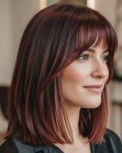 Sleek wine-colored shoulder-length hairstyle