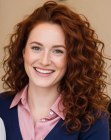 Long red hair with spiral curls