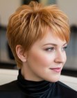 Strawberry blonde pixie cut