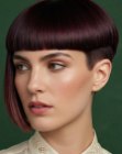 Short symmetrical haircut with blunt bangs
