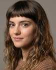 Long, wavy hair with short bangs