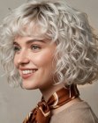 Platinum blonde bob with curls