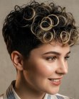 Hair with shaved sides and curls