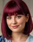 Red hair in a collar-length bob