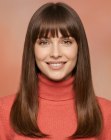 Long, sleek brown hair with bangs