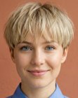 Blonde hair in a pixie cut
