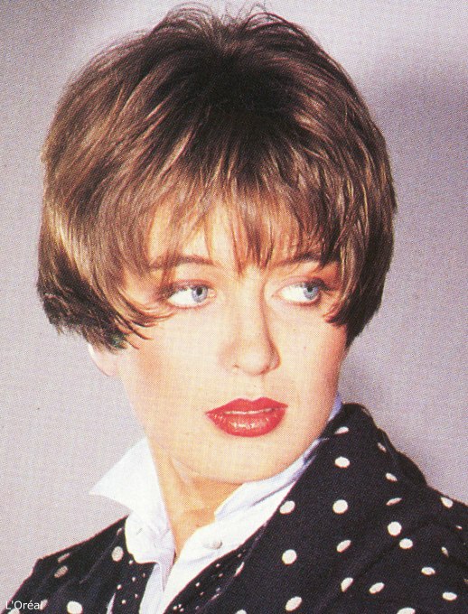 Short eighties hairstyle with the hair cut very short at the back | 1980s  look