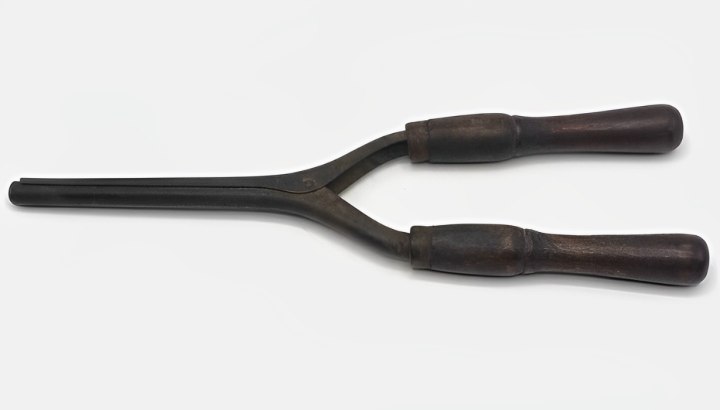 Antique curling iron