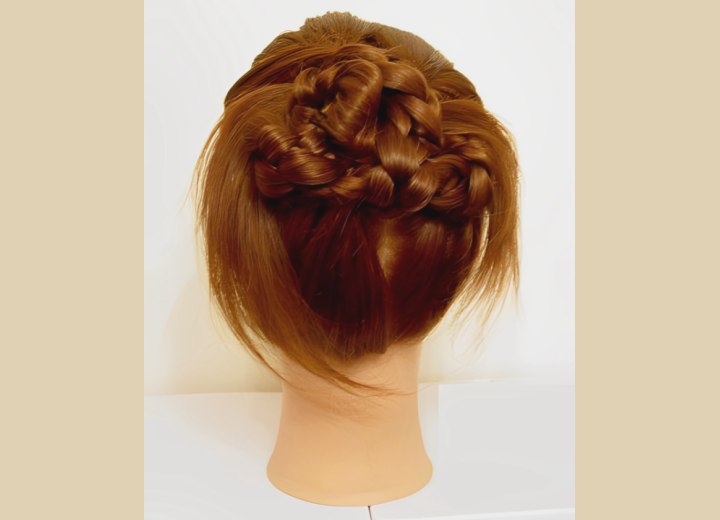 Hair styled in a braided bun