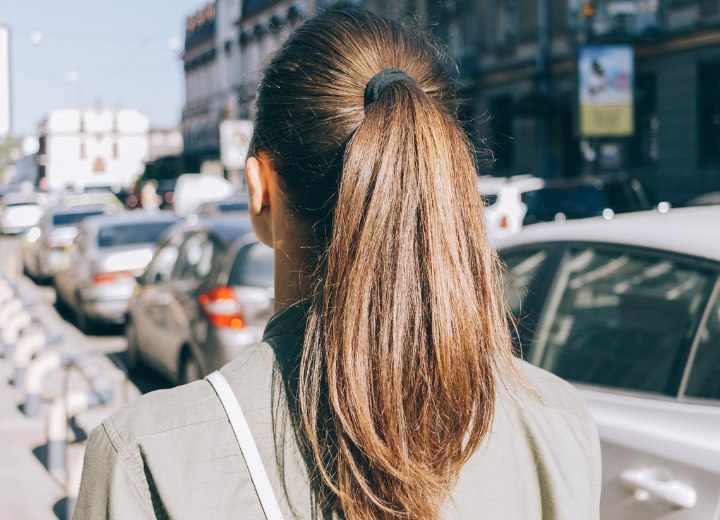 Sleek long hair styled in a ponytail