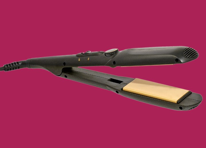 Flat iron with wide plates and a Marcel handle