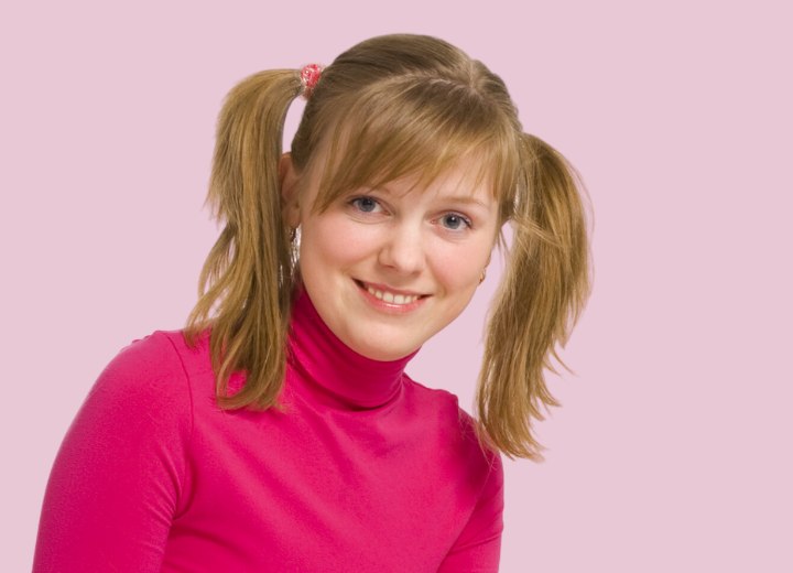Young woman wearing her hair in pigtails
