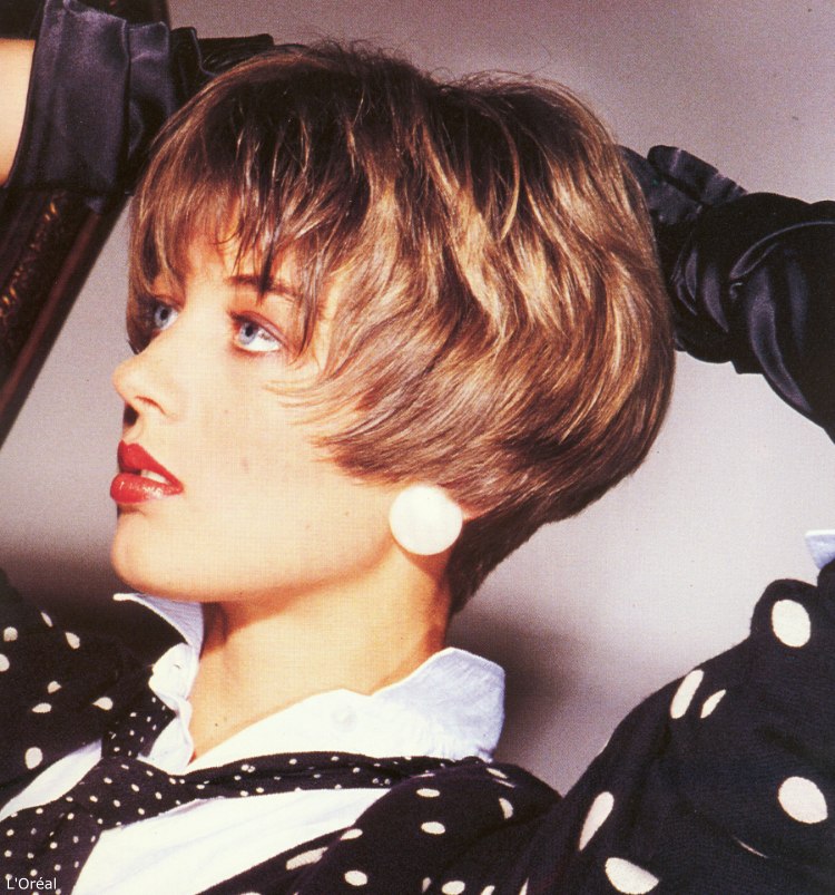 Short Eighties Hairstyle With The Hair Cut Very Short At The Back