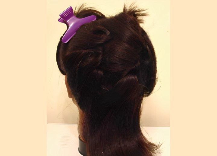 Updo for mid length hair how to - Section the hair into segments