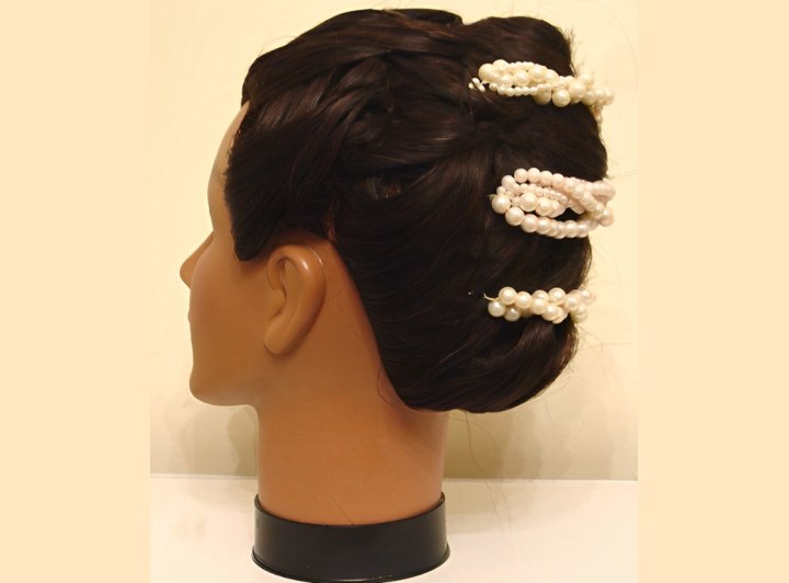 Updo for mid-length hair with jeweled hairpins